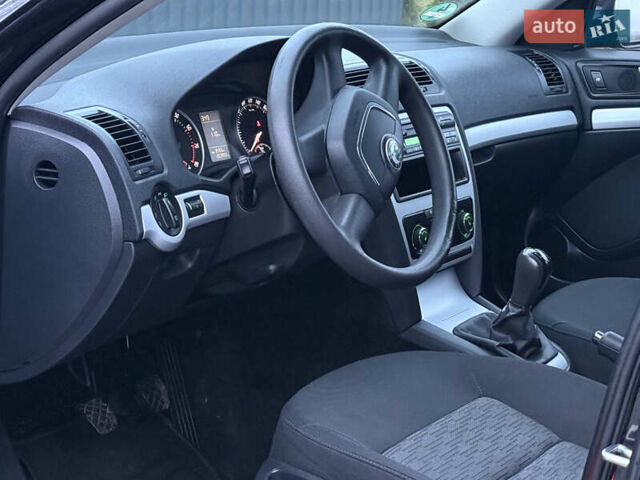 Черный Шкода Октавия, объемом двигателя 1.6 л и пробегом 202 тыс. км за 7490 $, фото 16 на Automoto.ua