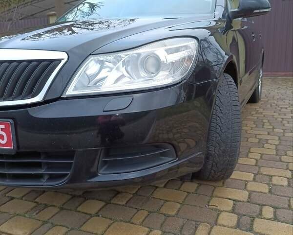 Чорний Шкода Октавія, об'ємом двигуна 1.4 л та пробігом 204 тис. км за 7550 $, фото 1 на Automoto.ua