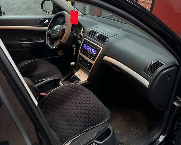Чорний Шкода Октавія, об'ємом двигуна 1.39 л та пробігом 140 тис. км за 7500 $, фото 7 на Automoto.ua