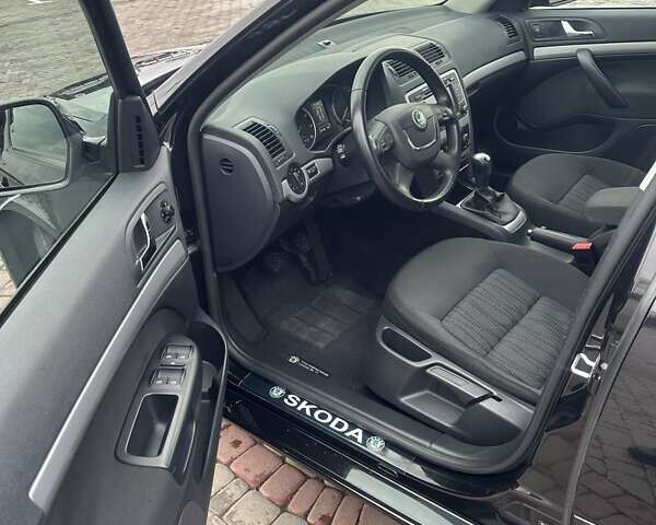 Черный Шкода Октавия, объемом двигателя 1.4 л и пробегом 233 тыс. км за 8199 $, фото 25 на Automoto.ua