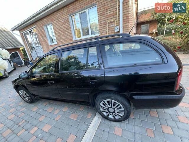 Черный Шкода Октавия, объемом двигателя 1.6 л и пробегом 198 тыс. км за 6700 $, фото 7 на Automoto.ua