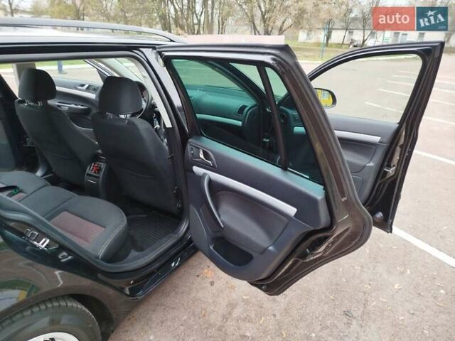 Чорний Шкода Октавія, об'ємом двигуна 1.98 л та пробігом 215 тис. км за 7650 $, фото 10 на Automoto.ua