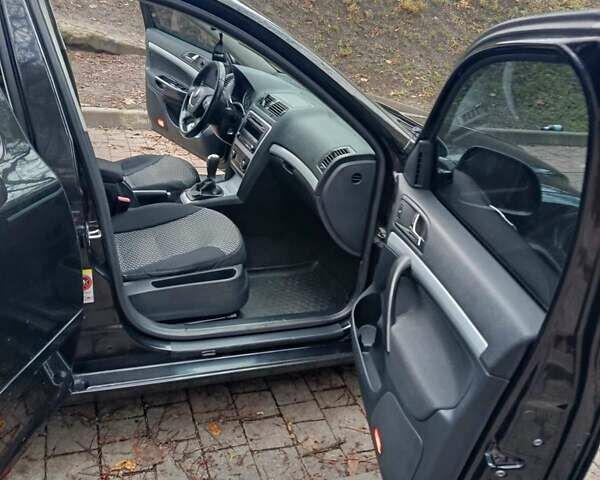 Черный Шкода Октавия, объемом двигателя 1.6 л и пробегом 258 тыс. км за 8600 $, фото 8 на Automoto.ua