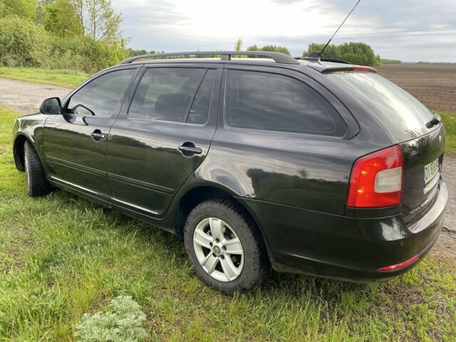 Черный Шкода Октавия, объемом двигателя 1.6 л и пробегом 279 тыс. км за 5100 $, фото 1 на Automoto.ua