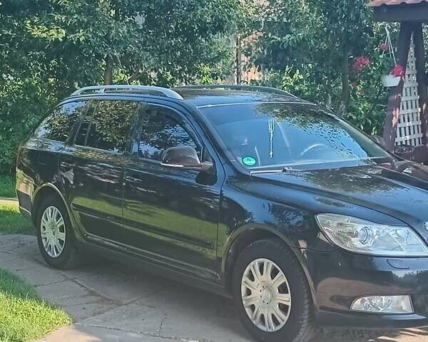 Чорний Шкода Октавія, об'ємом двигуна 1.2 л та пробігом 215 тис. км за 6300 $, фото 1 на Automoto.ua