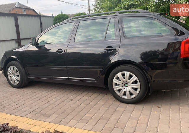 Чорний Шкода Октавія, об'ємом двигуна 1.6 л та пробігом 203 тис. км за 8900 $, фото 1 на Automoto.ua