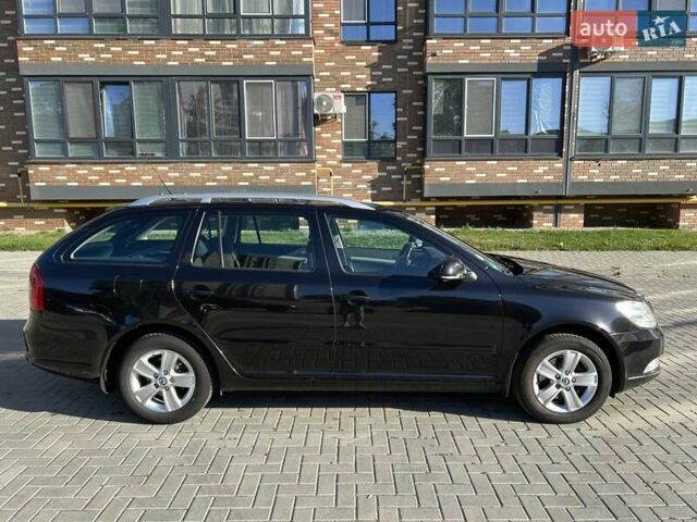 Чорний Шкода Октавія, об'ємом двигуна 2 л та пробігом 203 тис. км за 8900 $, фото 1 на Automoto.ua