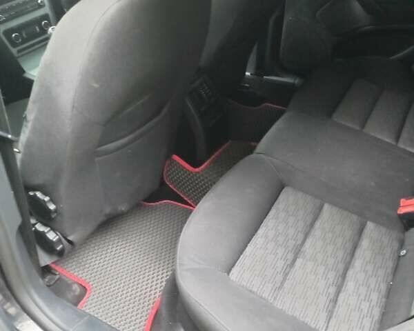 Чорний Шкода Октавія, об'ємом двигуна 1.2 л та пробігом 215 тис. км за 6300 $, фото 6 на Automoto.ua