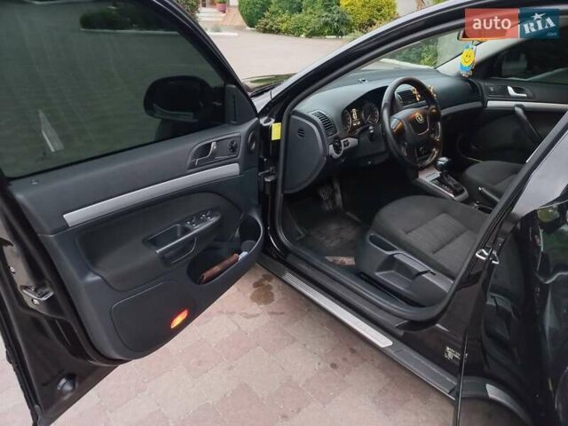 Черный Шкода Октавия, объемом двигателя 1.6 л и пробегом 300 тыс. км за 8500 $, фото 11 на Automoto.ua