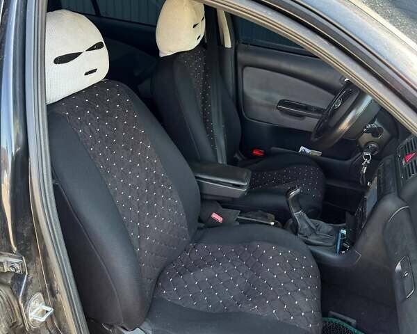 Черный Шкода Октавия, объемом двигателя 1.9 л и пробегом 290 тыс. км за 6600 $, фото 5 на Automoto.ua