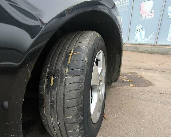 Черный Шкода Октавия, объемом двигателя 1.4 л и пробегом 215 тыс. км за 7300 $, фото 3 на Automoto.ua