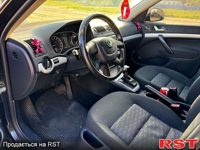 Черный Шкода Октавия, объемом двигателя 1.6 л и пробегом 286 тыс. км за 8600 $, фото 2 на Automoto.ua