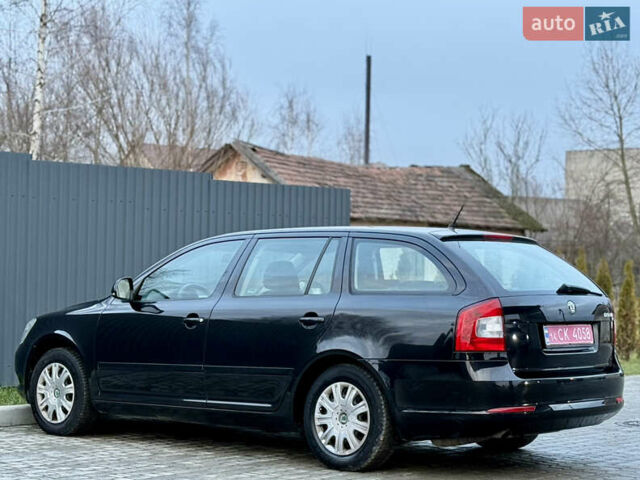 Черный Шкода Октавия, объемом двигателя 1.6 л и пробегом 202 тыс. км за 7490 $, фото 108 на Automoto.ua