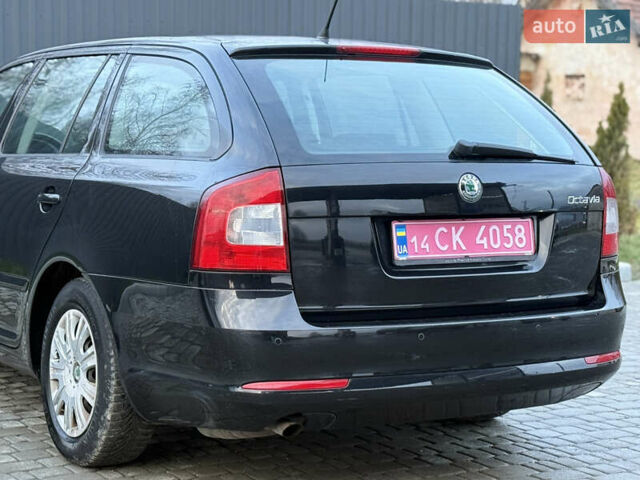 Черный Шкода Октавия, объемом двигателя 1.6 л и пробегом 202 тыс. км за 7490 $, фото 110 на Automoto.ua