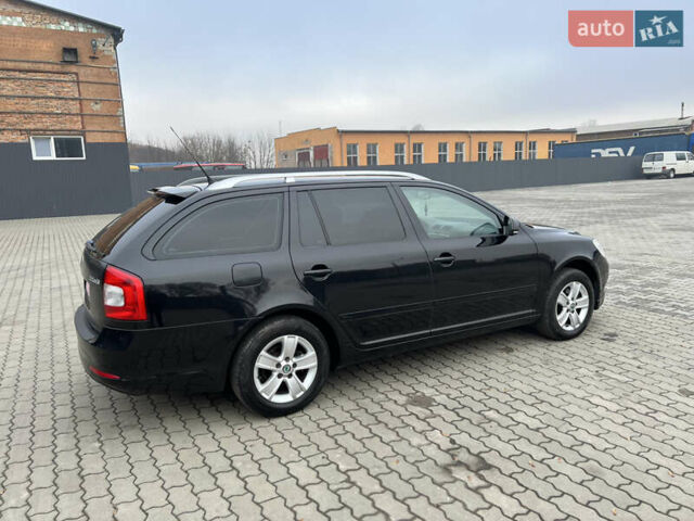 Чорний Шкода Октавія, об'ємом двигуна 1.6 л та пробігом 267 тис. км за 7770 $, фото 7 на Automoto.ua