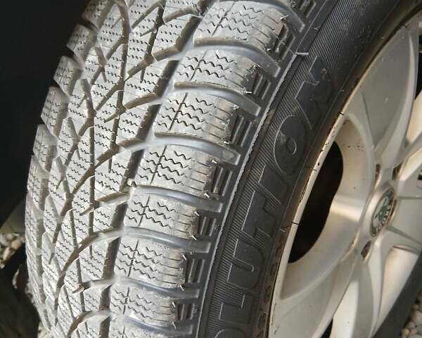 Черный Шкода Октавия, объемом двигателя 1.2 л и пробегом 283 тыс. км за 7900 $, фото 3 на Automoto.ua