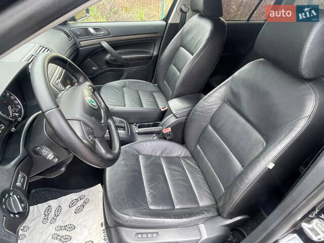 Чорний Шкода Октавія, об'ємом двигуна 2 л та пробігом 223 тис. км за 8999 $, фото 31 на Automoto.ua