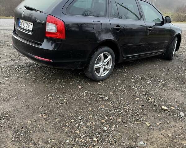 Черный Шкода Октавия, объемом двигателя 1.6 л и пробегом 253 тыс. км за 7500 $, фото 7 на Automoto.ua