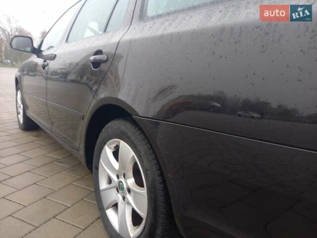 Черный Шкода Октавия, объемом двигателя 1.2 л и пробегом 186 тыс. км за 5950 $, фото 7 на Automoto.ua