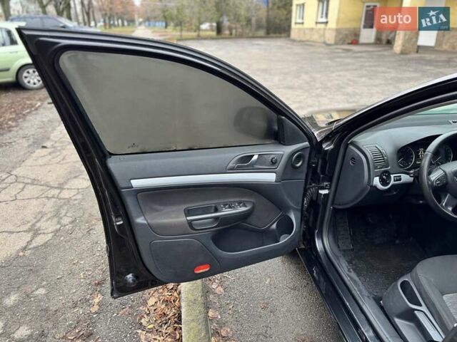 Черный Шкода Октавия, объемом двигателя 1.6 л и пробегом 305 тыс. км за 7600 $, фото 12 на Automoto.ua