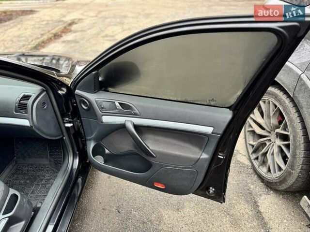 Черный Шкода Октавия, объемом двигателя 1.6 л и пробегом 305 тыс. км за 7600 $, фото 11 на Automoto.ua