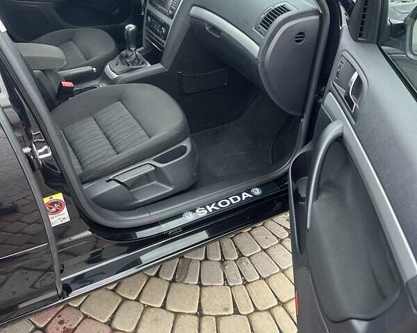 Черный Шкода Октавия, объемом двигателя 1.4 л и пробегом 233 тыс. км за 8199 $, фото 18 на Automoto.ua