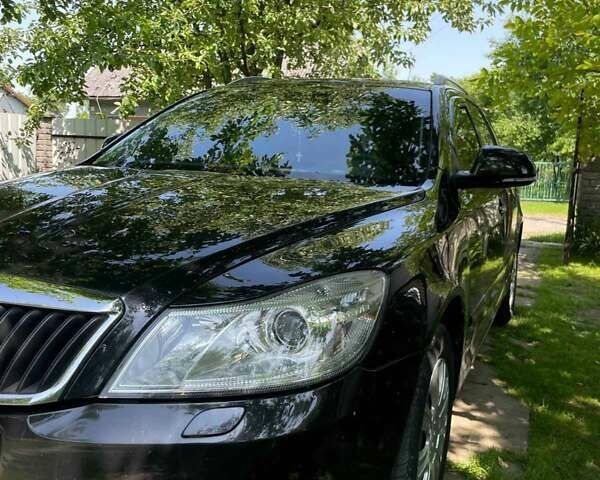 Чорний Шкода Октавія, об'ємом двигуна 1.2 л та пробігом 215 тис. км за 6300 $, фото 14 на Automoto.ua