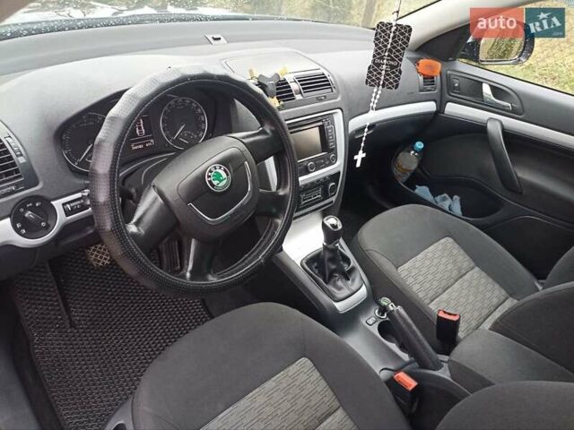 Черный Шкода Октавия, объемом двигателя 1.39 л и пробегом 268 тыс. км за 6500 $, фото 2 на Automoto.ua