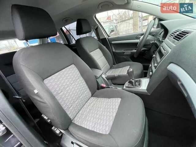 Черный Шкода Октавия, объемом двигателя 1.6 л и пробегом 176 тыс. км за 7550 $, фото 7 на Automoto.ua