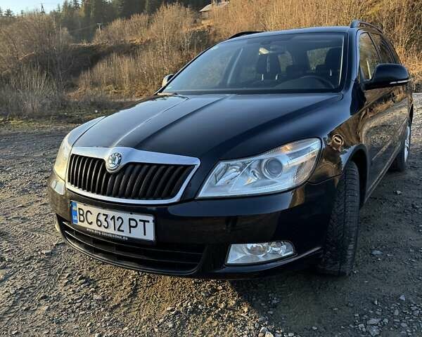 Черный Шкода Октавия, объемом двигателя 1.6 л и пробегом 253 тыс. км за 7500 $, фото 1 на Automoto.ua