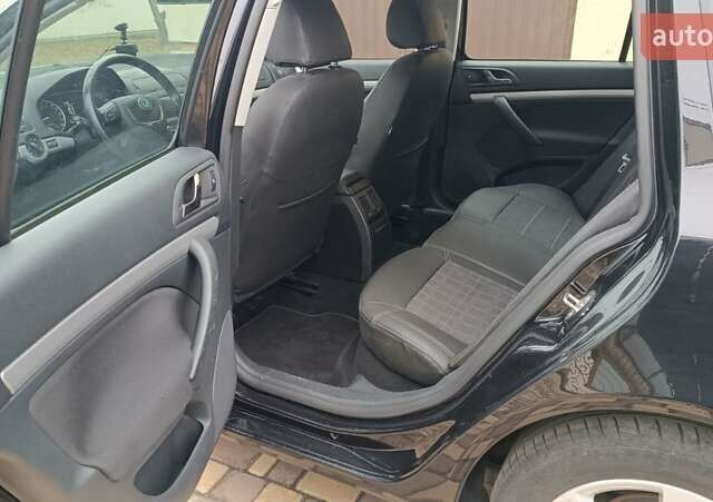 Черный Шкода Октавия, объемом двигателя 1.6 л и пробегом 201 тыс. км за 7300 $, фото 9 на Automoto.ua