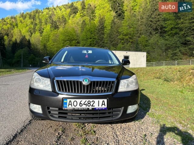 Черный Шкода Октавия, объемом двигателя 2 л и пробегом 241 тыс. км за 9400 $, фото 1 на Automoto.ua
