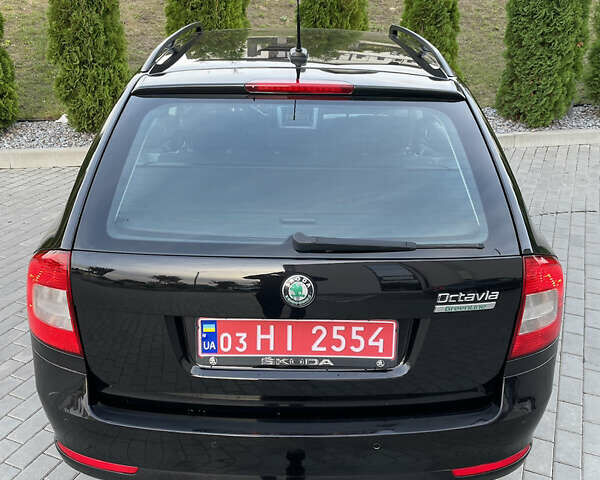 Чорний Шкода Октавія, об'ємом двигуна 1.6 л та пробігом 194 тис. км за 9399 $, фото 16 на Automoto.ua
