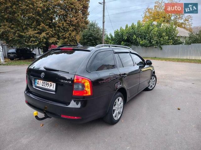 Шкода Октавія 2011 у Борисполе на Automoto.ua Чорний Шкода Октавія, об'ємом двигуна 1.6 л та пробігом 348 тис. км за 8700 $, фото 17 на Automoto.ua