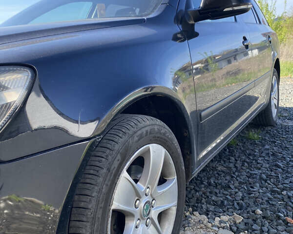 Чорний Шкода Октавія, об'ємом двигуна 1.6 л та пробігом 380 тис. км за 7999 $, фото 1 на Automoto.ua