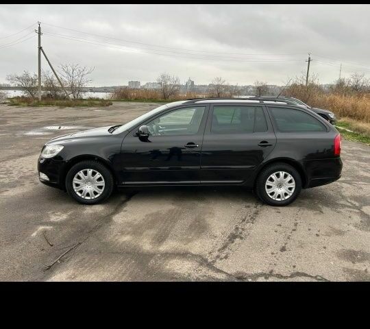 Чорний Шкода Октавія, об'ємом двигуна 1.8 л та пробігом 230 тис. км за 6750 $, фото 1 на Automoto.ua