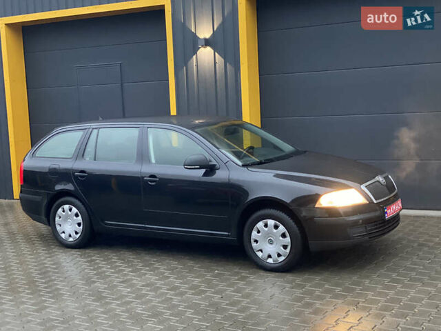 Черный Шкода Октавия, объемом двигателя 1.6 л и пробегом 198 тыс. км за 6999 $, фото 40 на Automoto.ua