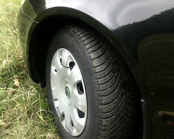 Черный Шкода Октавия, объемом двигателя 1.6 л и пробегом 184 тыс. км за 8900 $, фото 18 на Automoto.ua