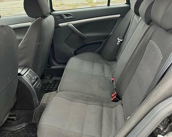 Черный Шкода Октавия, объемом двигателя 1.4 л и пробегом 238 тыс. км за 7500 $, фото 4 на Automoto.ua