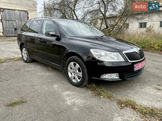 Шкода Октавия 2011 в Ковель на Automoto.ua Черный Шкода Октавия, объемом двигателя 1.4 л и пробегом 231 тыс. км за 7400 $, фото 6 на Automoto.ua