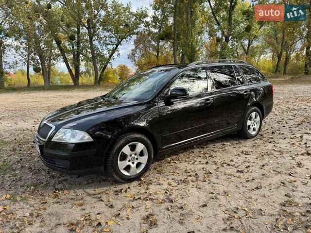 Шкода Октавия 2011 в Полтаве на Automoto.ua Черный Шкода Октавия, объемом двигателя 1.6 л и пробегом 220 тыс. км за 7600 $, фото 9 на Automoto.ua