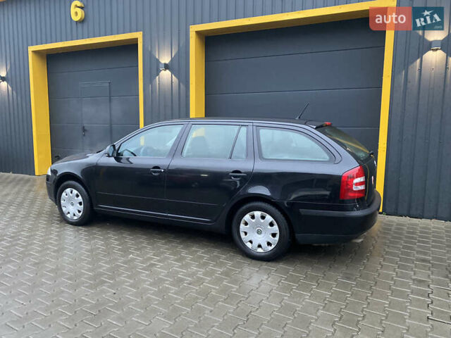 Черный Шкода Октавия, объемом двигателя 1.6 л и пробегом 198 тыс. км за 6999 $, фото 4 на Automoto.ua