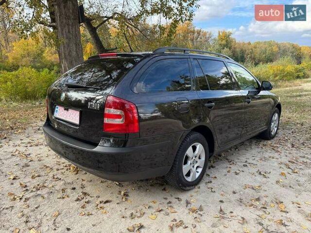 Шкода Октавия 2011 в Полтаве на Automoto.ua Черный Шкода Октавия, объемом двигателя 1.6 л и пробегом 220 тыс. км за 7600 $, фото 29 на Automoto.ua