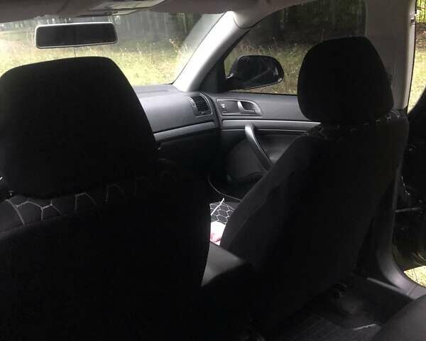 Черный Шкода Октавия, объемом двигателя 1.6 л и пробегом 184 тыс. км за 8900 $, фото 21 на Automoto.ua