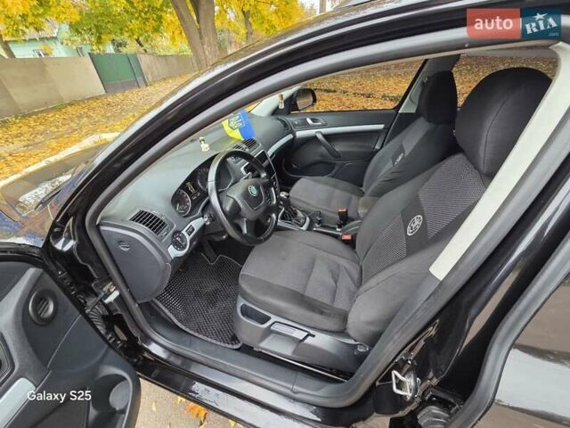 Черный Шкода Октавия, объемом двигателя 1.6 л и пробегом 243 тыс. км за 8999 $, фото 9 на Automoto.ua