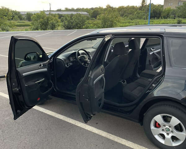 Чорний Шкода Октавія, об'ємом двигуна 1.6 л та пробігом 318 тис. км за 7200 $, фото 14 на Automoto.ua