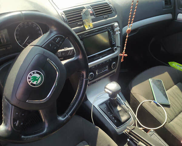 Чорний Шкода Октавія, об'ємом двигуна 1.2 л та пробігом 240 тис. км за 6600 $, фото 7 на Automoto.ua