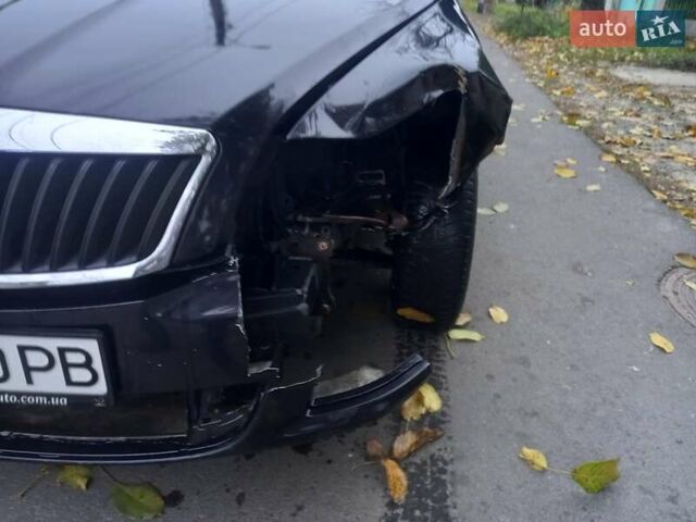 Чорний Шкода Октавія, об'ємом двигуна 1.2 л та пробігом 200 тис. км за 5500 $, фото 13 на Automoto.ua
