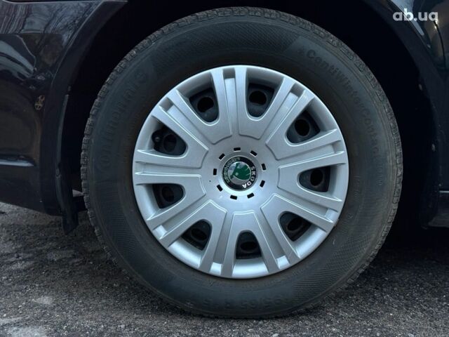 Черный Шкода Октавия, объемом двигателя 1.6 л и пробегом 237 тыс. км за 8190 $, фото 10 на Automoto.ua