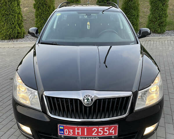 Чорний Шкода Октавія, об'ємом двигуна 1.6 л та пробігом 194 тис. км за 9399 $, фото 41 на Automoto.ua